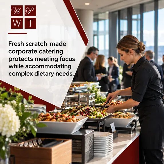 Caterer serving fresh salads and entrees from a buffet line at a corporate event with guests in business attire